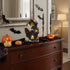 Decorațiune Halloween casă cu fantome, craniu și lumini LED 17cm