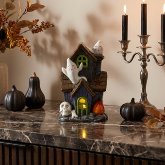 Decorațiune Halloween casă cu fantome, craniu și lumini LED 17cm