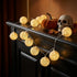 Ghirlandă luminoasă bile bumbac aurii 10 LED, 165cm