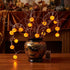 Ghirlandă luminoasă Halloween cu 10 mini dovleci LED 165cm