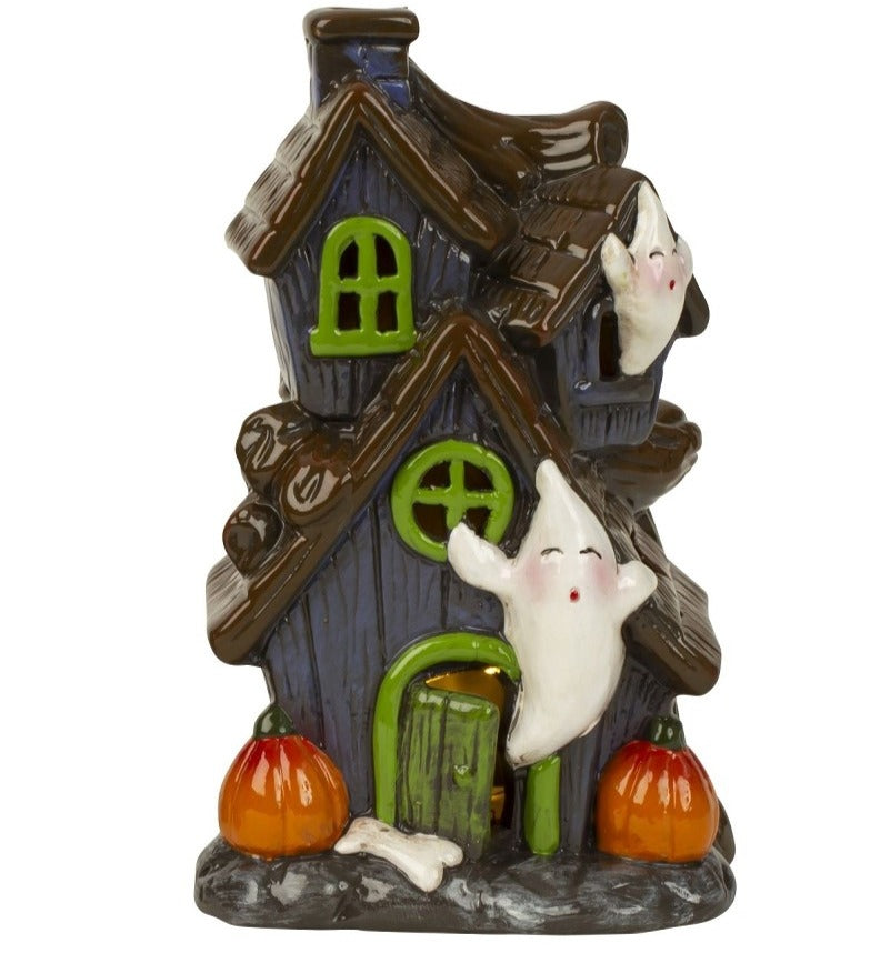 Decorațiune de Halloween în formă de casă bântuită cu fantome, dovleci și lumină led