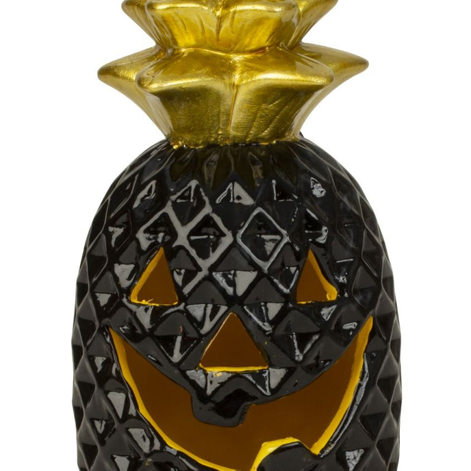 Dovleac decorativ pentru Halloween, în culori negru și auriu, cu led stins