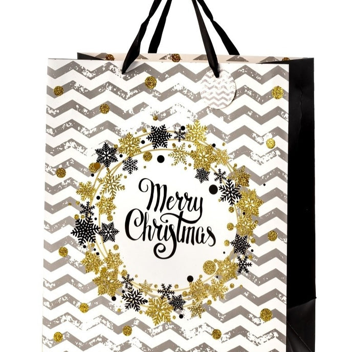 Pungă cadou de Crăciun, cu model zig-zag în alb și gri, cu fulgi aurii