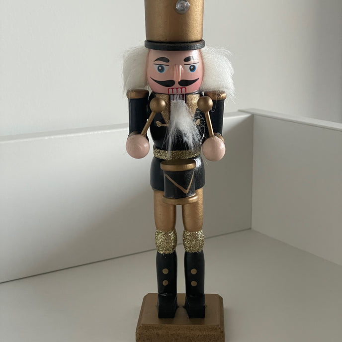 Spărgător de nuci toboșar negru cu auriu 