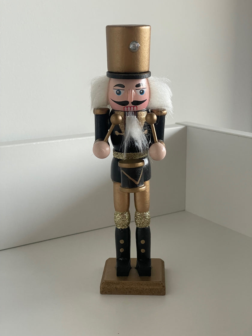 Spărgător de nuci toboșar negru cu auriu 